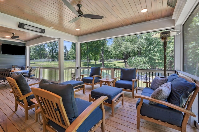 2670 Morgan Rd, Joelton, TN 37080 - deck with outdoor lounge area, a ceiling fan, and view of scattered trees