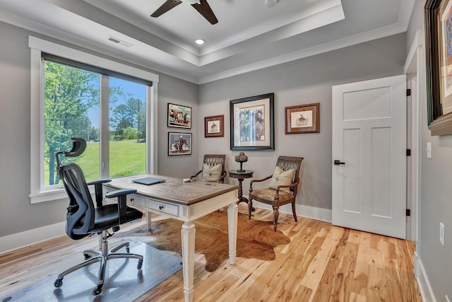 2670 Morgan Rd, Joelton, TN 37080 - home office with a raised ceiling, ceiling fan, baseboards, light wood finished floors, and crown molding