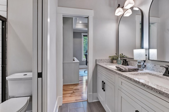 2670 Morgan Rd, Joelton, TN 37080 - bathroom with double vanity, toilet, and baseboards