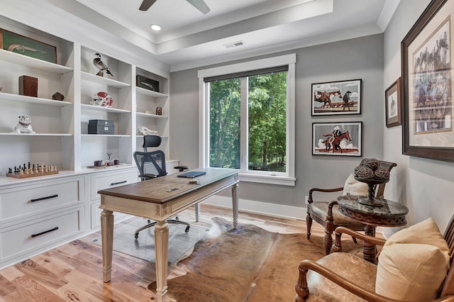 2670 Morgan Rd, Joelton, TN 37080 - office space featuring a ceiling fan, light wood-type flooring, baseboards, a tray ceiling, and crown molding