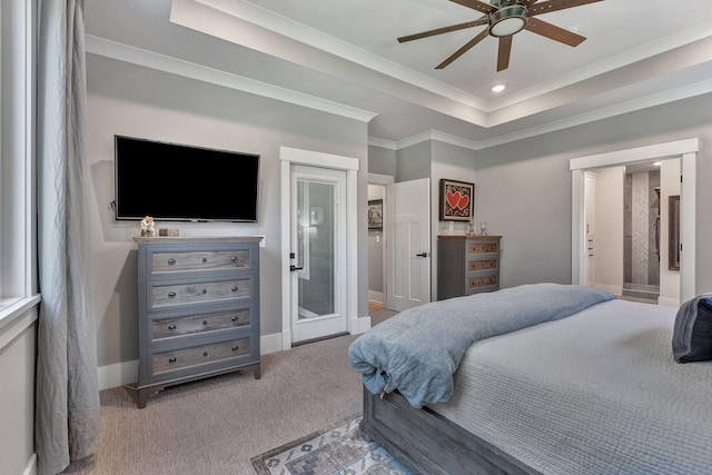2670 Morgan Rd, Joelton, TN 37080 - bedroom with light colored carpet, crown molding, a tray ceiling, access to exterior, and baseboards