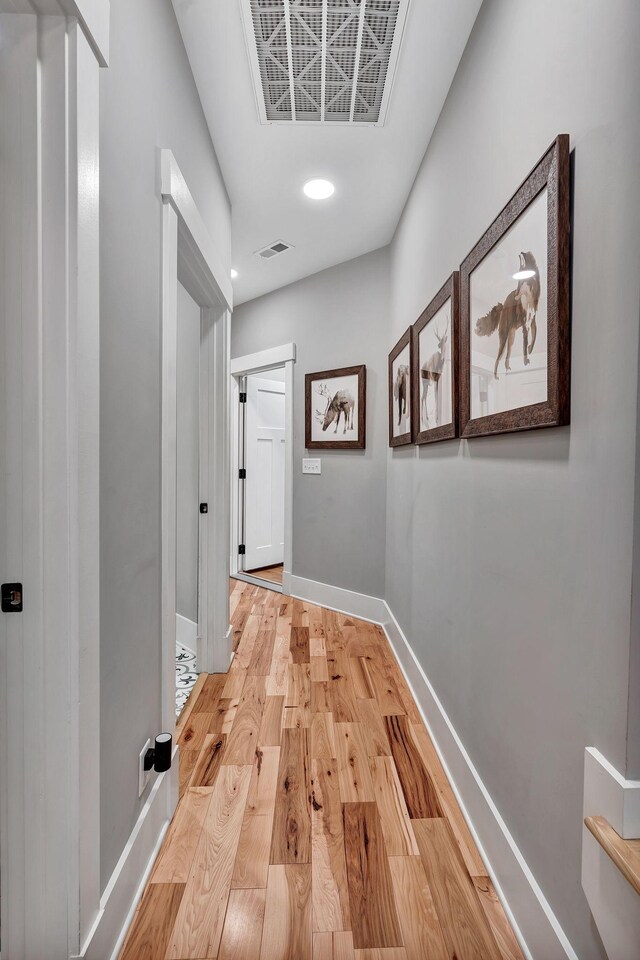 2670 Morgan Rd, Joelton, TN 37080 - corridor featuring light wood finished floors, baseboards, and recessed lighting
