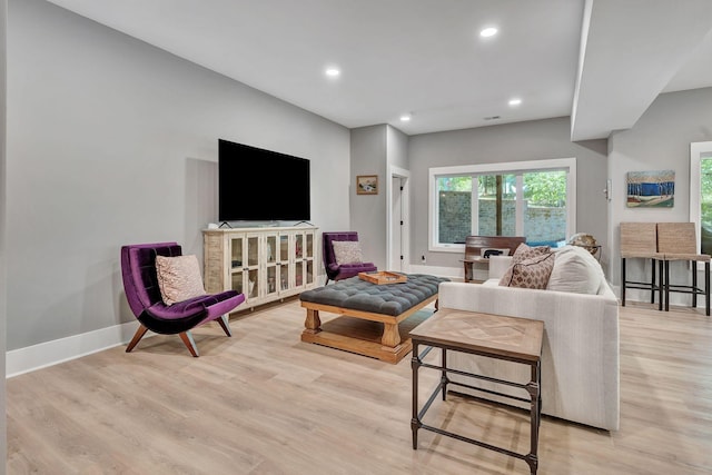 2670 Morgan Rd, Joelton, TN 37080 - living area featuring light wood-type flooring, recessed lighting, and baseboards
