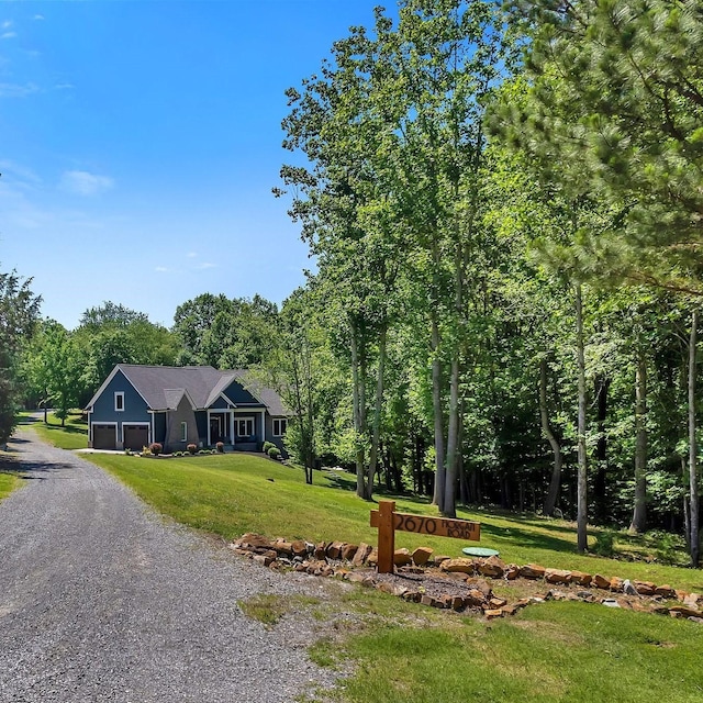 2670 Morgan Rd, Joelton, TN 37080 - ranch-style home with driveway, a front lawn, and an attached garage
