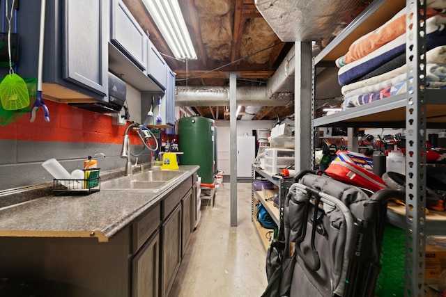 916 Lion Pkwy, Columbia, TN 38401 - unfinished basement featuring a sink and a water pressure tank