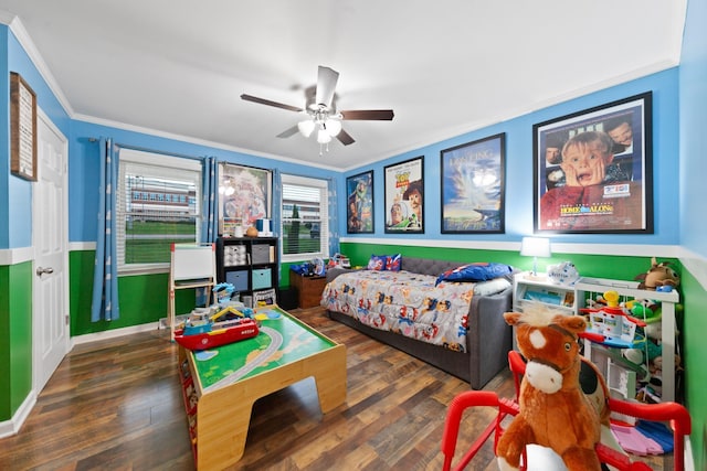 916 Lion Pkwy, Columbia, TN 38401 - bedroom with wood finished floors, crown molding, ceiling fan, and baseboards