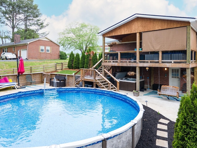 916 Lion Pkwy, Columbia, TN 38401 - swimming pool featuring stairway, a patio area, and a wooden deck