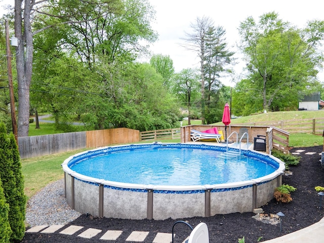 916 Lion Pkwy, Columbia, TN 38401 - view of swimming pool with view of wooded area