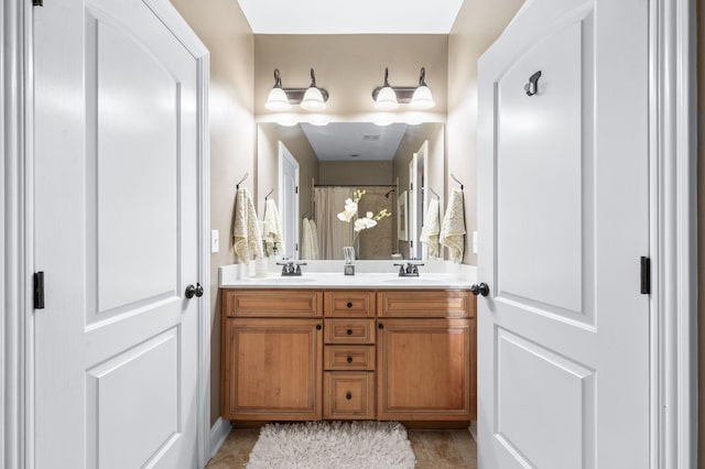 3009 Burnley Ct, Spring Hill, TN 37174 - full bath featuring double vanity, tile patterned floors, and curtained shower