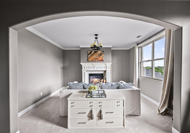3009 Burnley Ct, Spring Hill, TN 37174 - living room with light carpet, baseboards, a glass covered fireplace, and crown molding
