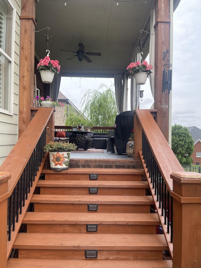 3009 Burnley Ct, Spring Hill, TN 37174 - wooden terrace with stairs, a ceiling fan, and grilling area