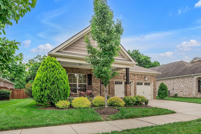 1144 Frewin St, Nolensville, TN 37135 - craftsman-style house featuring driveway, brick siding, covered porch, and a garage