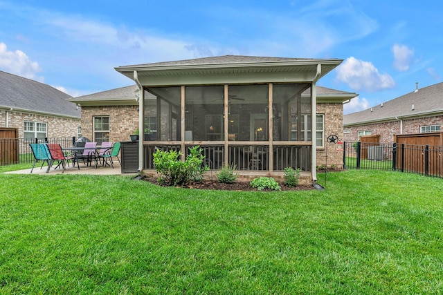 1144 Frewin St, Nolensville, TN 37135 - rear view of property with a sunroom, a patio area, and brick siding