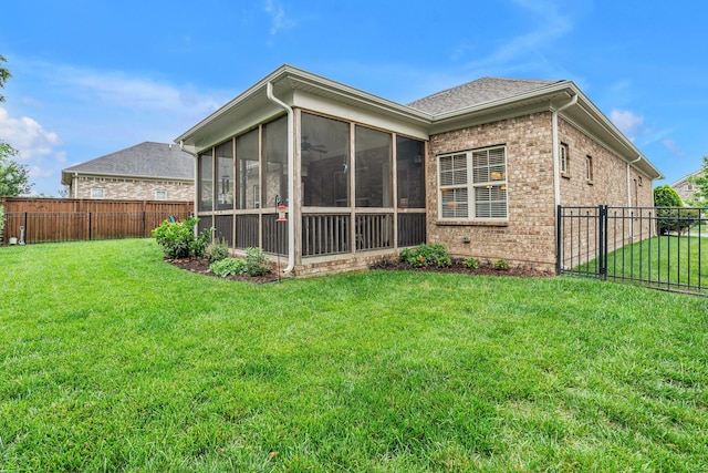 1144 Frewin St, Nolensville, TN 37135 - rear view of property featuring brick siding and a sunroom