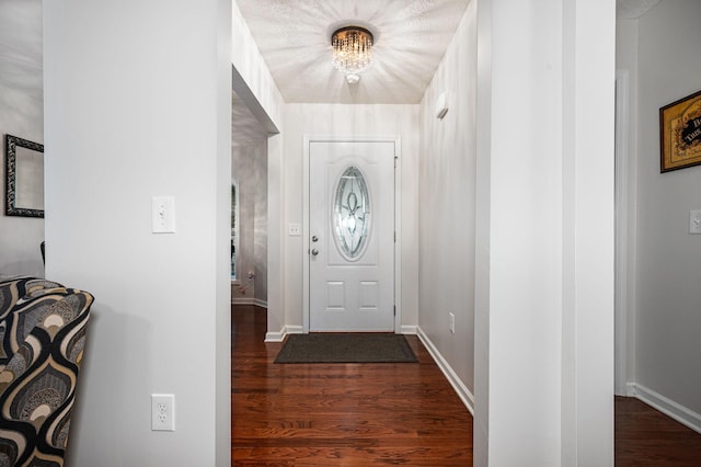 2480 Mount Lebanon Rd, Lewisburg, TN 37091 - entrance foyer with dark wood finished floors, a chandelier, and baseboards