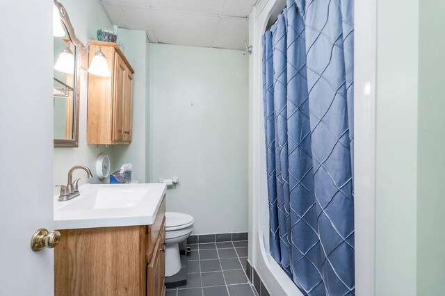 192 Askin Ln, Baxter, TN 38544 - full bathroom with vanity, toilet, tile patterned flooring, a shower with curtain, and a paneled ceiling
