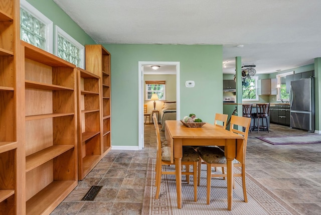 192 Askin Ln, Baxter, TN 38544 - dining room featuring stone finish flooring and healthy amount of natural light