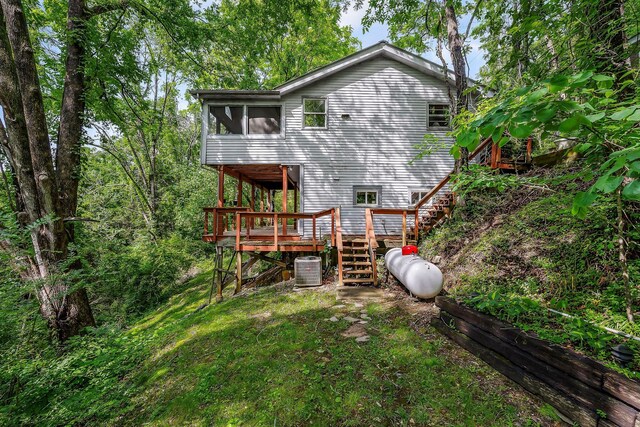 192 Askin Ln, Baxter, TN 38544 - back of property with stairs, a wooden deck, cooling unit, and a sunroom