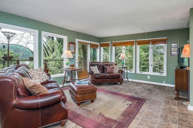 192 Askin Ln, Baxter, TN 38544 - living area with attic access, baseboards, and stone finish flooring