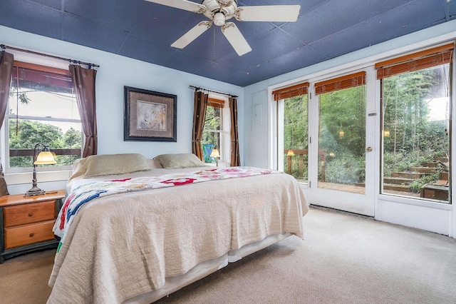 192 Askin Ln, Baxter, TN 38544 - bedroom with access to outside, carpet flooring, multiple windows, and a ceiling fan