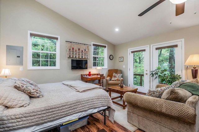 192 Askin Ln, Baxter, TN 38544 - bedroom featuring electric panel, wood finished floors, access to exterior, lofted ceiling, and multiple windows