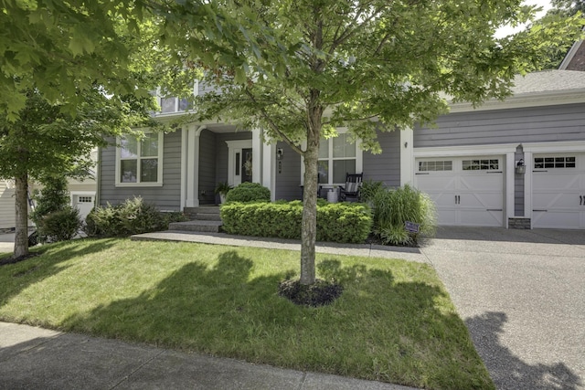 410 Dabney Dr, Franklin, TN 37064 - obstructed view of property featuring driveway and a front lawn