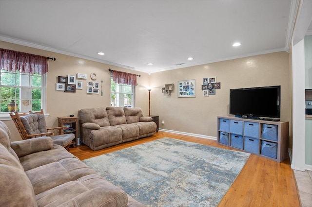 1310 Tabitha Dr, Hixson, TN 37343 - living area featuring ornamental molding, wood finished floors, recessed lighting, and baseboards