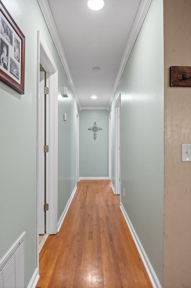 1310 Tabitha Dr, Hixson, TN 37343 - hall featuring wood-type flooring, crown molding, baseboards, and recessed lighting