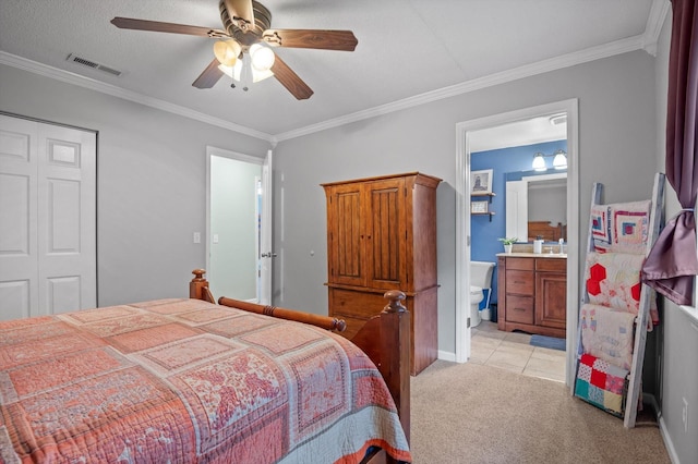 1310 Tabitha Dr, Hixson, TN 37343 - bedroom with light colored carpet, ornamental molding, ensuite bathroom, a ceiling fan, and baseboards