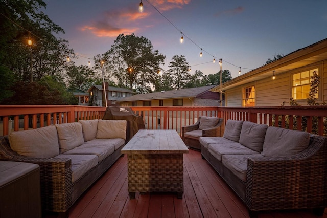 1310 Tabitha Dr, Hixson, TN 37343 - deck at dusk with an outdoor living space