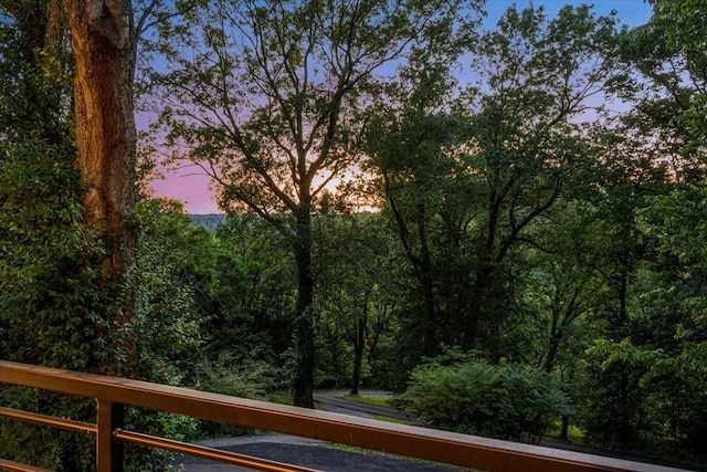 5400 Hillsboro Pike, Nashville, TN 37215 - yard at dusk with a wooded view