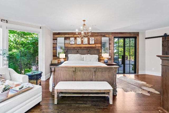 5400 Hillsboro Pike, Nashville, TN 37215 - bedroom with baseboards, access to outside, a chandelier, a barn door, and ornamental molding