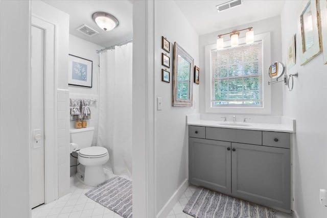 5400 Hillsboro Pike, Nashville, TN 37215 - bathroom with vanity, toilet, tile patterned flooring, and baseboards