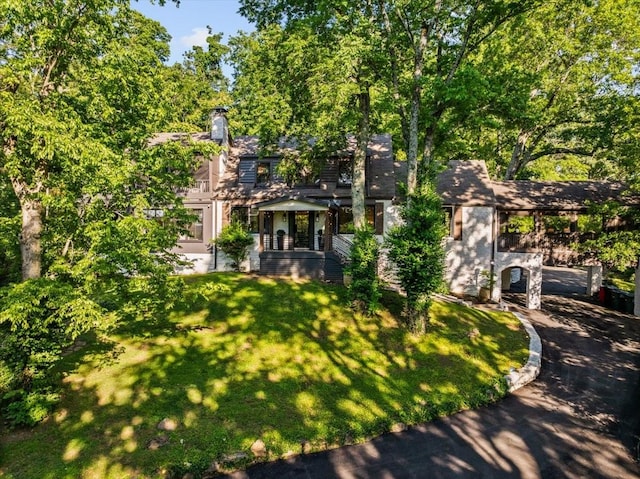 5400 Hillsboro Pike, Nashville, TN 37215 - view of front facade featuring a front lawn and a carport