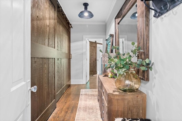 5400 Hillsboro Pike, Nashville, TN 37215 - entryway featuring a barn door, dark wood-style flooring, and crown molding