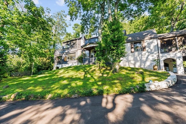 5400 Hillsboro Pike, Nashville, TN 37215 - view of front of house featuring a balcony and a front yard