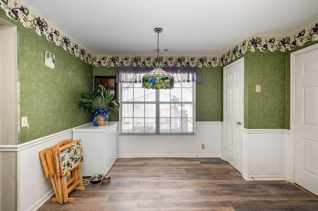 1113 Jacksons Valley Rd, Hermitage, TN 37076 - unfurnished dining area with wood finished floors and wallpapered walls