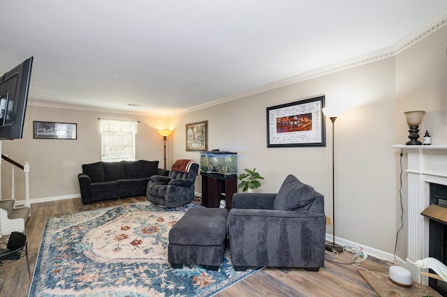 1113 Jacksons Valley Rd, Hermitage, TN 37076 - living area with wood finished floors, stairway, crown molding, a fireplace, and baseboards
