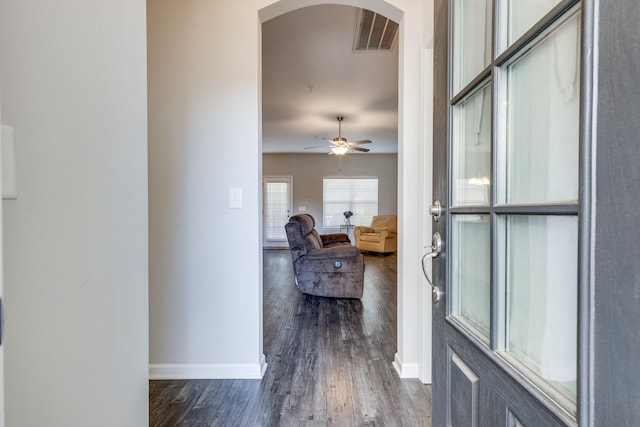 221 Kinsale Dr, Spring Hill, TN 37174 - foyer entrance with arched walkways, dark wood-style flooring, baseboards, and a ceiling fan