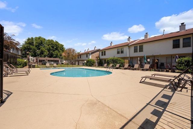 250 Sanders Ferry Rd Unit 65, Hendersonville, TN 37075 - community pool featuring a patio and a residential view