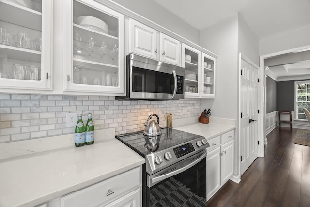 5517 Nevil Pt, Brentwood, TN 37027 - kitchen with appliances with stainless steel finishes, white cabinetry, glass insert cabinets, light countertops, and tasteful backsplash
