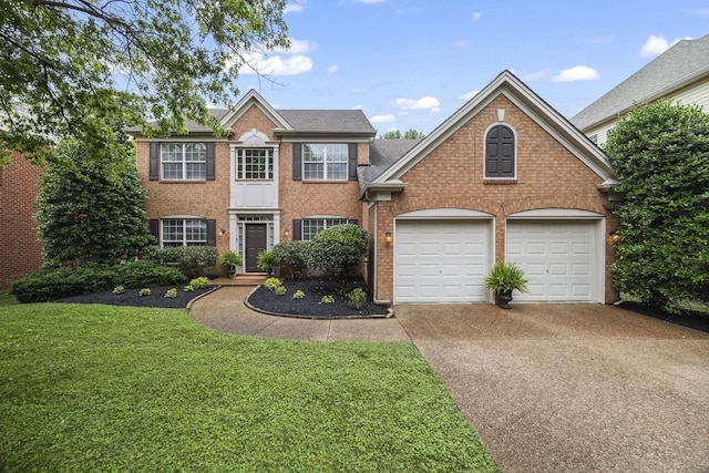 5517 Nevil Pt, Brentwood, TN 37027 - view of front of house featuring brick siding, concrete driveway, a front yard, an attached garage, and a shingled roof