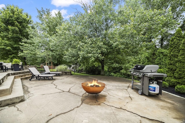 5517 Nevil Pt, Brentwood, TN 37027 - view of patio featuring an outdoor fire pit and a grill