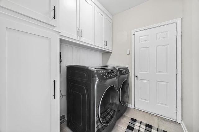 5517 Nevil Pt, Brentwood, TN 37027 - washroom with washer and clothes dryer, cabinet space, and baseboards