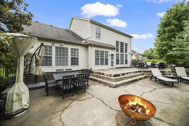 5517 Nevil Pt, Brentwood, TN 37027 - view of patio featuring an outdoor fire pit and outdoor dining space