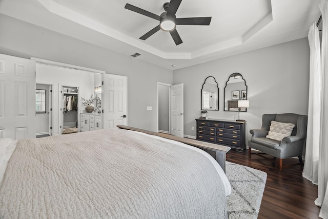 5517 Nevil Pt, Brentwood, TN 37027 - bedroom with a raised ceiling, dark wood finished floors, a spacious closet, a closet, and a ceiling fan
