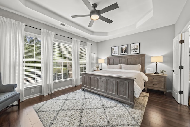 5517 Nevil Pt, Brentwood, TN 37027 - bedroom with a raised ceiling, dark wood finished floors, and baseboards