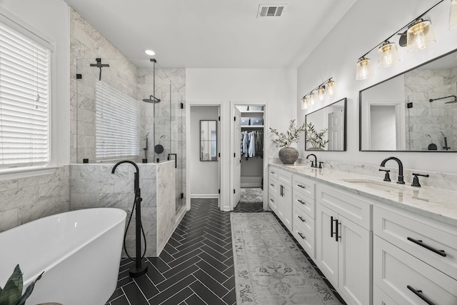 5517 Nevil Pt, Brentwood, TN 37027 - full bathroom with a shower stall, double vanity, a freestanding bath, and a walk in closet