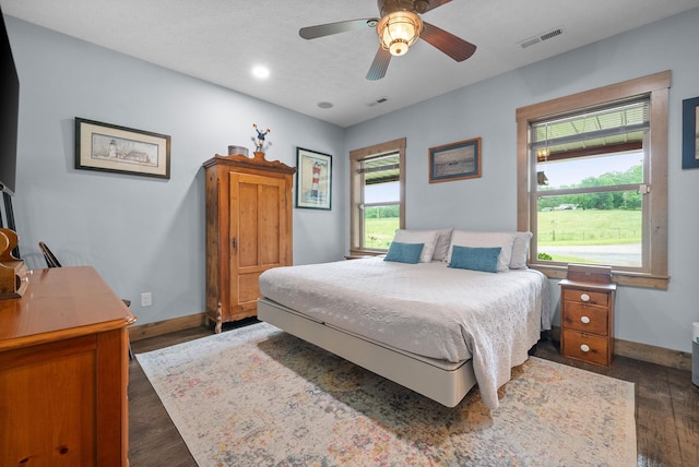 4499 Benson Rd, Springfield, TN 37172 - bedroom featuring dark wood-style floors, baseboards, and a ceiling fan