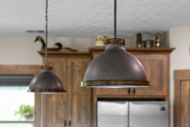 4499 Benson Rd, Springfield, TN 37172 - kitchen view of pendant lighting and brown cabinets